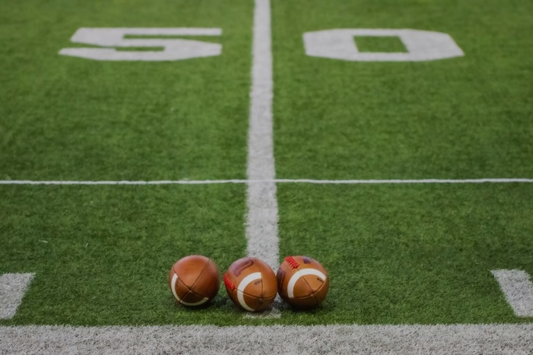 50-yard line footballs